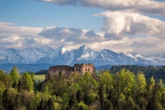 Castle in Czorsztyn against the background of snowy Tatra mountains, Poland